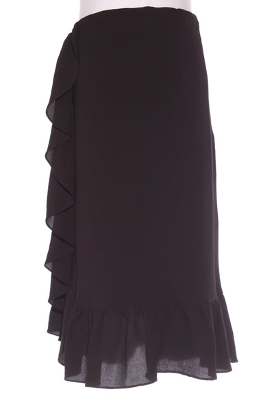 STELLA ROYAL (LN) Cross over ruffle trim skirt! 18